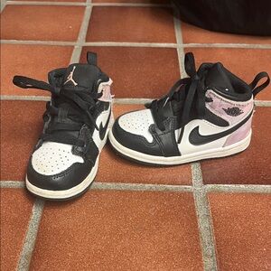Kids Black and Pink High-Top Nike Jordans